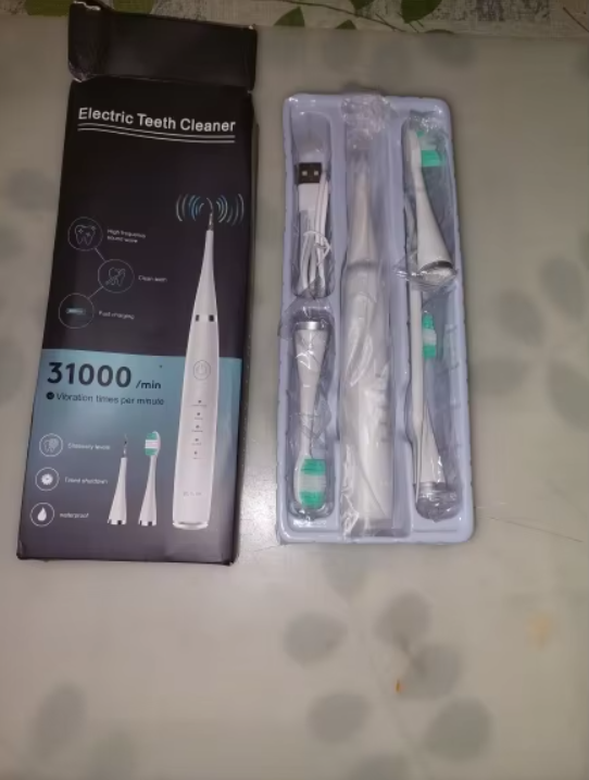 ELECTRIC TEETH CLEANER ®