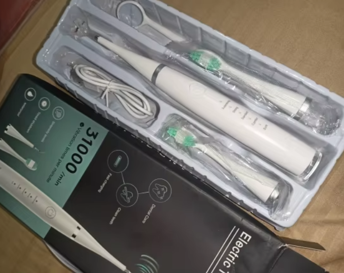ELECTRIC TEETH CLEANER ®